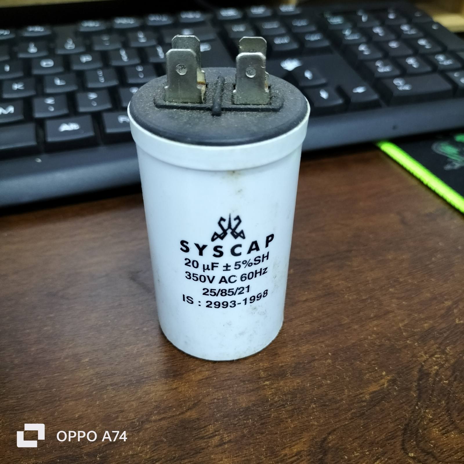 Syscap 20MFD 350 VAC Running Capacitor white cylindrical electrical component on desk