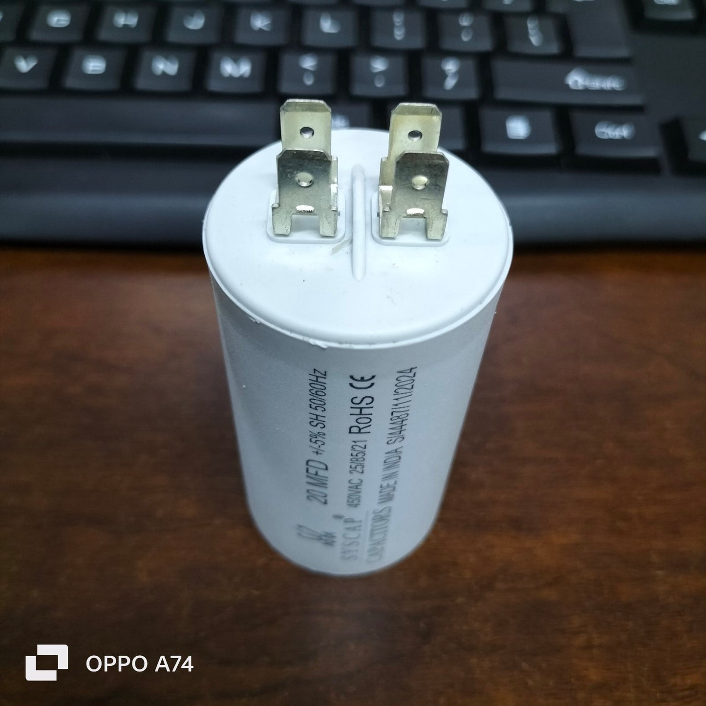 20uF 450V motor running capacitor by Syscap with two connector prongs for electrical applications
