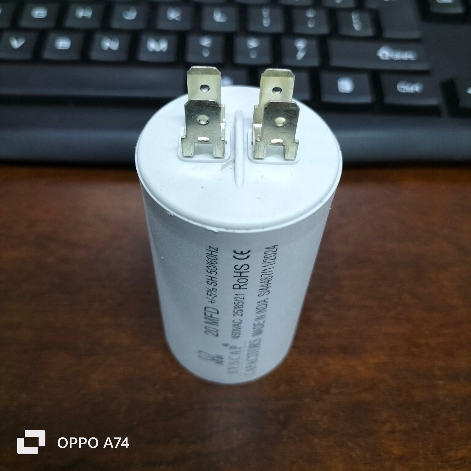 20uF 450V motor running capacitor by Syscap with two connector prongs for electrical applications