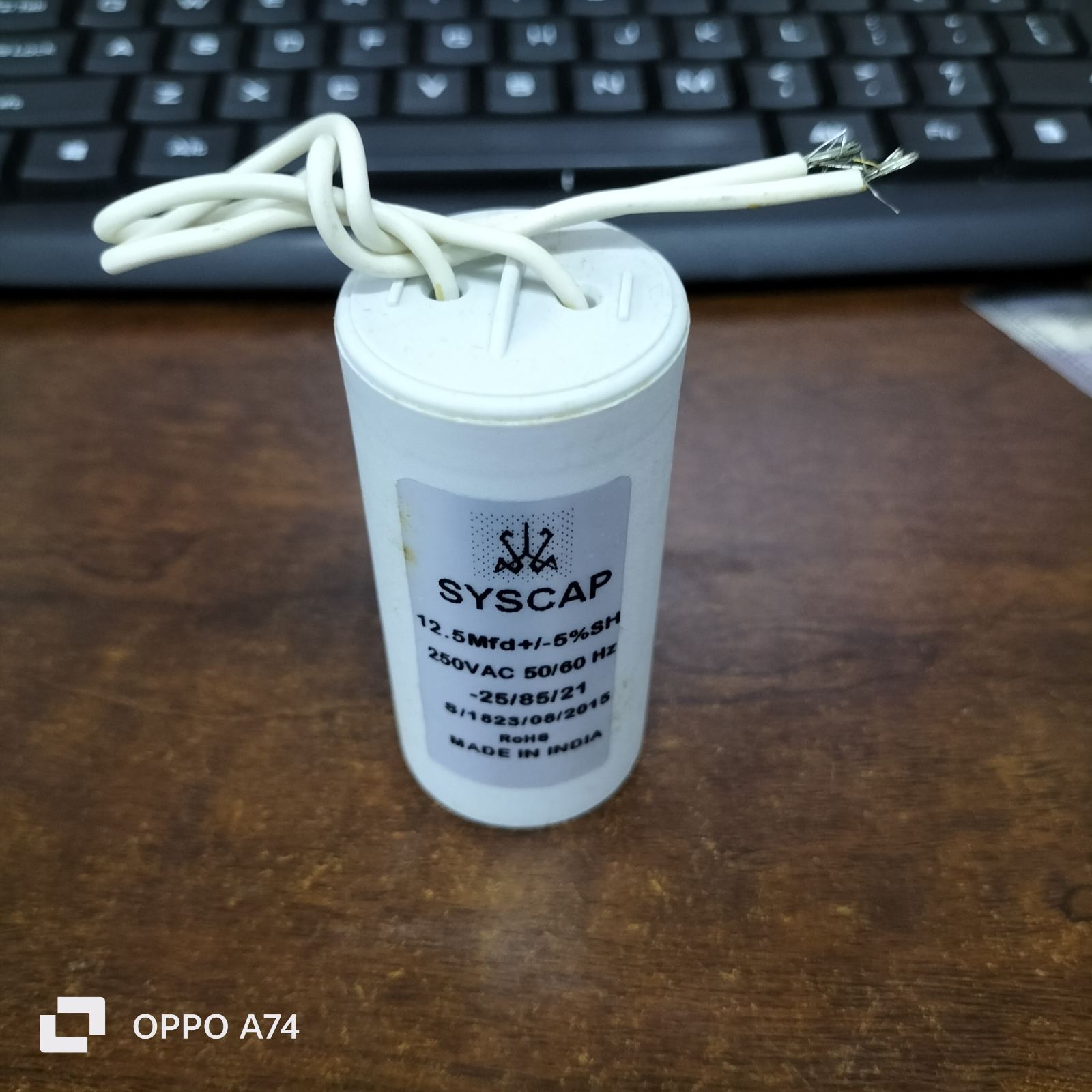 Syscap 250 VAC Running Capacitor with 12.5 Mfd specifications for electrical circuits