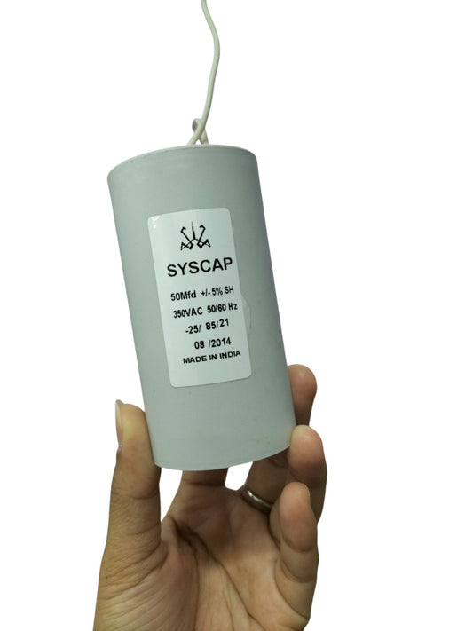 Syscap 50MFD 350V AC Running Capacitor held in hand for electrical circuitry use
