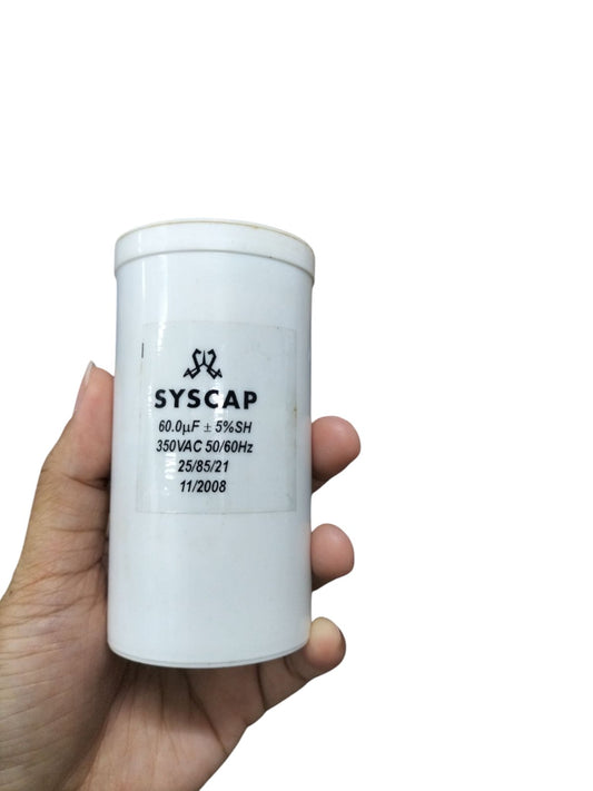 Syscap 60MFD 350V AC Running Capacitor white cylindrical electrical component held in hand