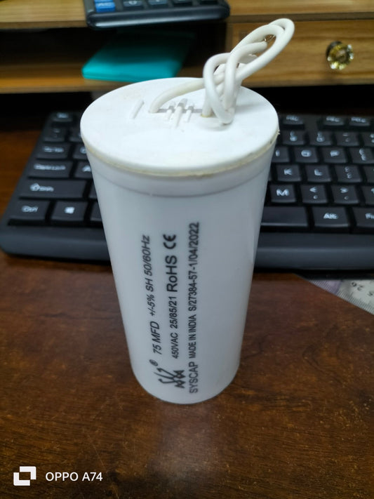 SYSCAP 75MFD motor capacitor 450V AC white cylindrical electrical component with wires on wooden desk