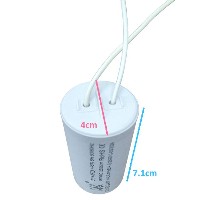 Syscap electrical capacitor for motors with white cylindrical body and wires for motor circuits