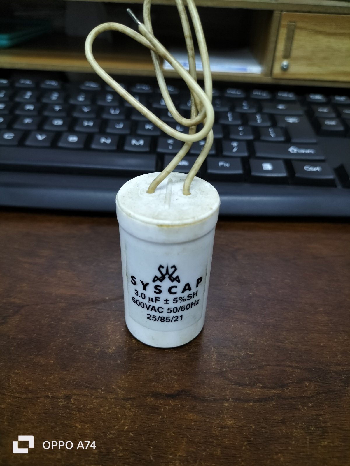 Syscap 3.0 uF Motor Capacitor for 600VAC applications with two wires attached