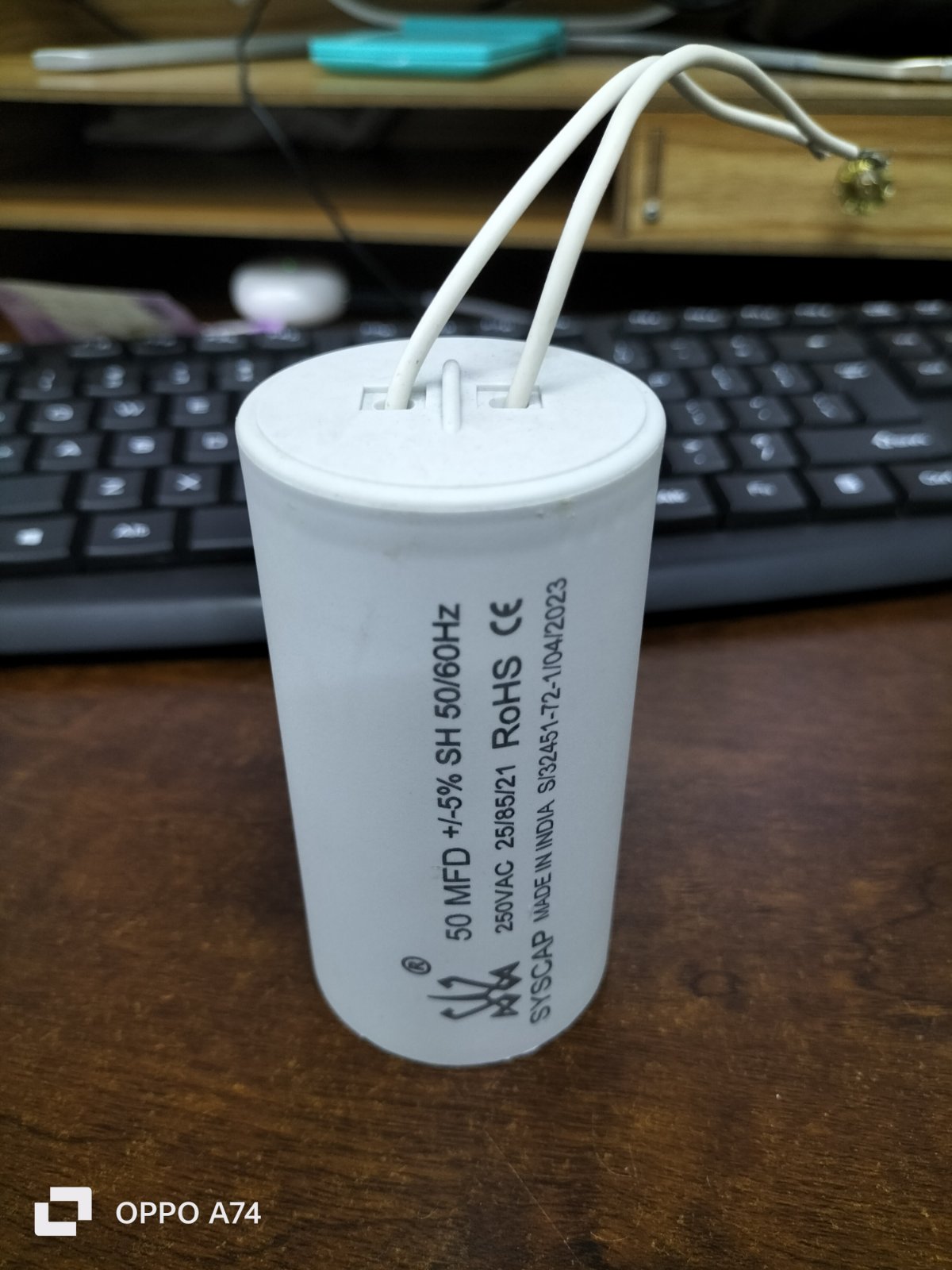 Syscap motor capacitor 50MFD white cylindrical electrical component with wires
