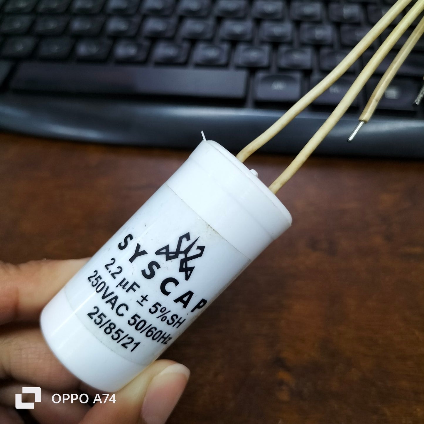 Syscap motor running capacitor 250v with 2.2uF rating and multiple connection leads