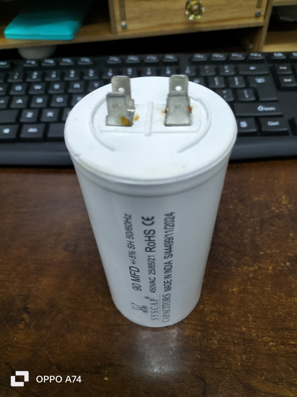 SYSCAP Motor Running Capacitor 90MFD 450V AC white cylindrical electrical component on wooden desk