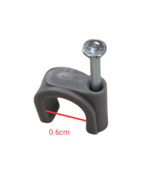 Close-up of a gray Tailee Nail Clip with attached nail showing 0.6 cm measurement for hand tool accessory