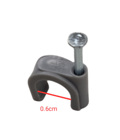 Close-up of a gray Tailee Nail Clip with attached nail showing 0.6 cm measurement for hand tool accessory