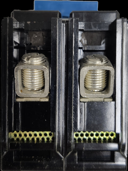 Close-up of Taiyou 15A 2 Pole Circuit Breaker showing metallic terminals and black plastic casing