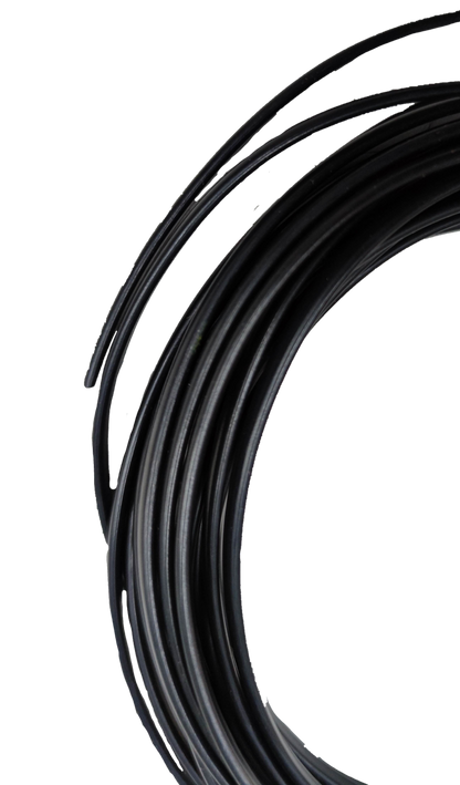 Black telephone flat wire for extension coiled neatly against black background