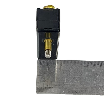 Tend limit switch close up brass plunger black body with ruler for scale Limit Switch 15A 250VAC TM1305