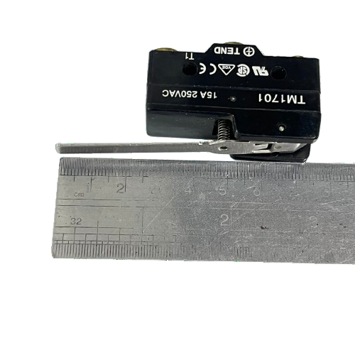 Tend Limit Switch 15A 250VAC black micro switch with long metal lever shown next to ruler for scale
