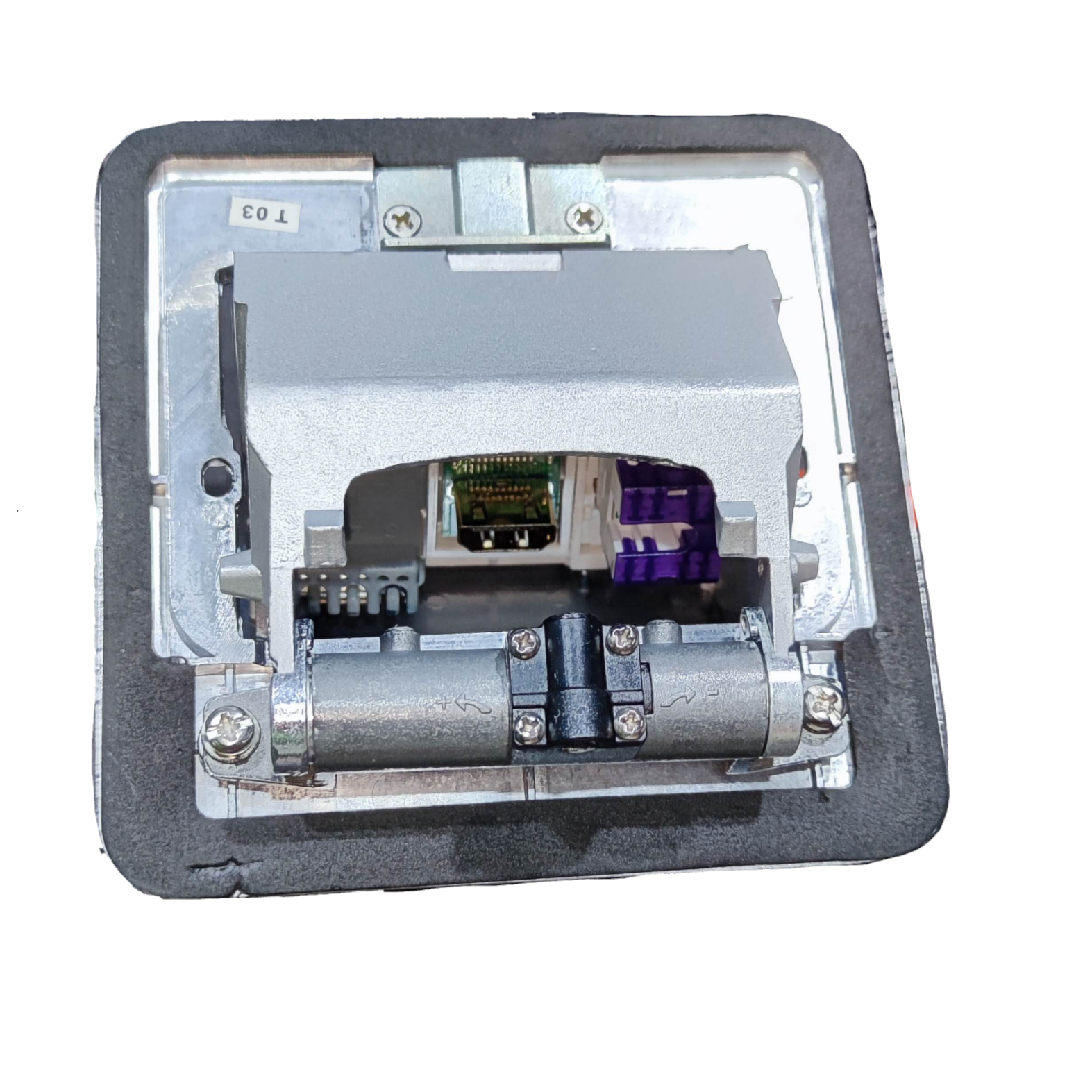 T and J recessed metal pop-up box with HDMI and CAT6 ports showing internal hinge and connector layout