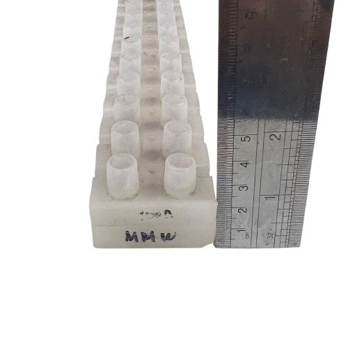 Sassin 100A 12 Pairs PVC Terminal Block white connector with ruler showing scale for electrical safety