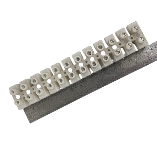 Sassin 100A 12 Pairs PVC Terminal Block white screw terminal strip shown with metal ruler for scale