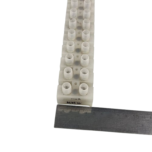 Sassin 100A 12 Pairs PVC Terminal Block white screw terminal strip shown with ruler for scale