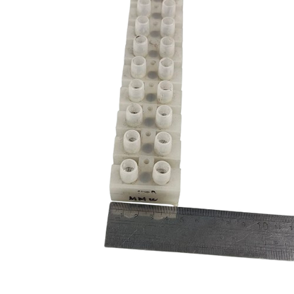 Sassin 100A 12 Pairs PVC Terminal Block white screw terminal strip shown with ruler for scale