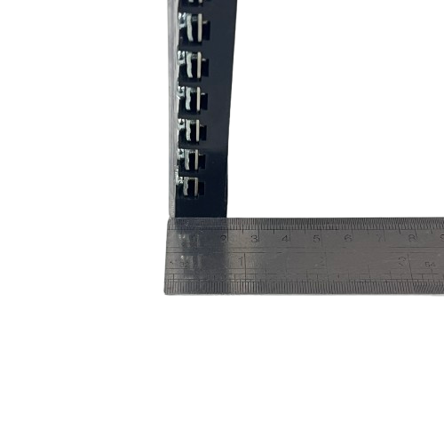 Grippes 25A 12 Pair Terminal Block 600V black modular terminal strip shown with metal ruler for scale