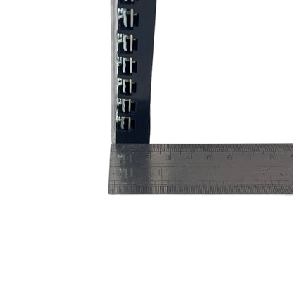 Grippes 25A 12 Pair Terminal Block 600V black modular terminal strip shown with metal ruler for scale