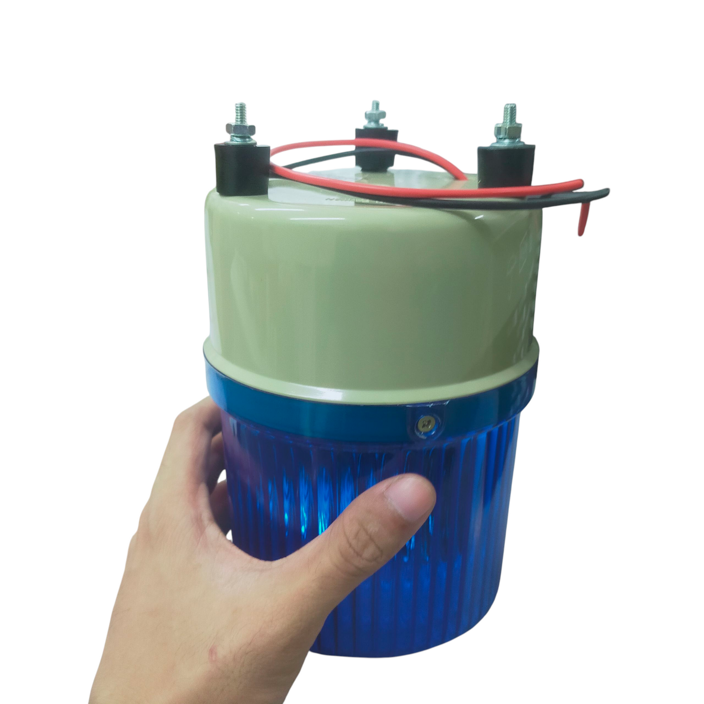 Sifco Rotary Warning light 24V DC - Blue held in hand, showcasing its vibrant design and wiring connections