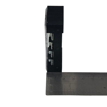 Grippes 25A 4 Pairs Terminal Block 600V black side view showing four pair metal terminals next to ruler