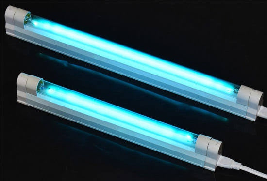 Firefly and China UV-C Germicidal Tube fluorescent tubes glowing blue for disinfection