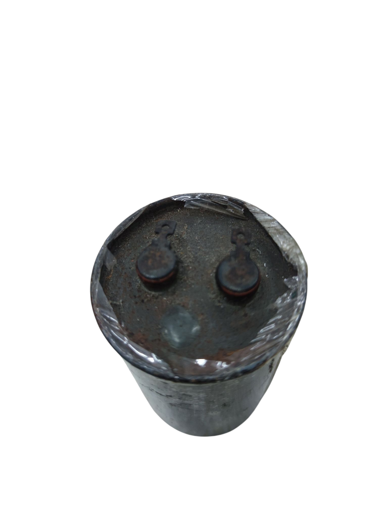 Sprague 5 uF 220V capacitor for sale with a worn exterior and two connection terminals