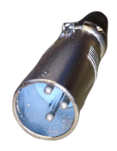 Close-up of black XLR Male Canon Plug studio equipment connector from China on black background